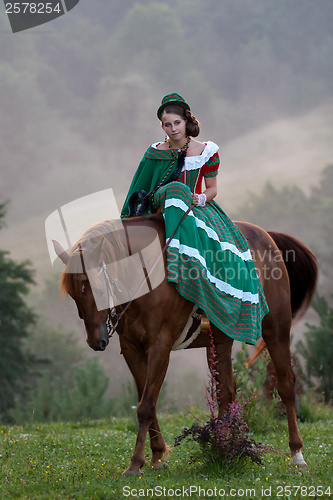 Image of Girl riding equestrian classicism dress