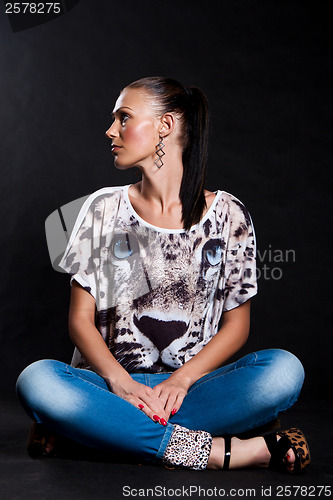 Image of Long-haired woman in shirt with tiger