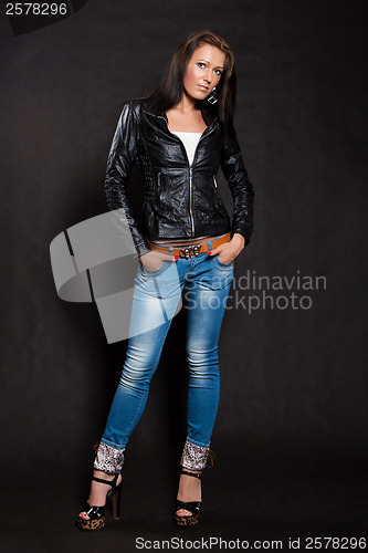 Image of Long-haired woman in a leather jacket