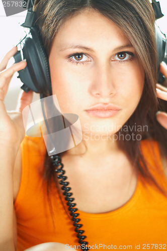 Image of Sexy Girl with headphones close up