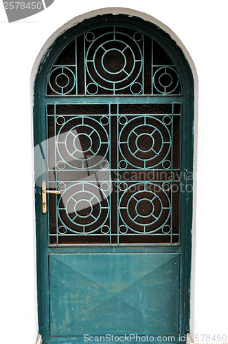 Image of metal door with concentric circles motif
