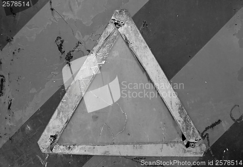 Image of weathered rusty sign