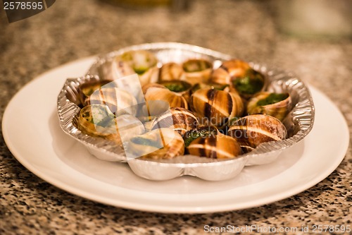 Image of Close up of Escargots with garlic butter