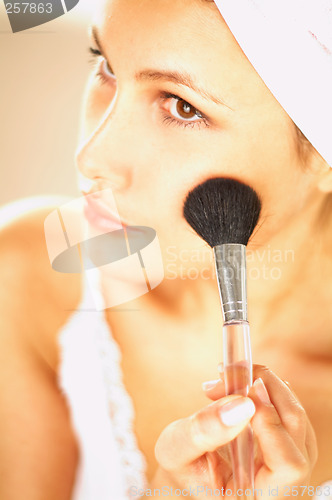 Image of Girl doing makeup