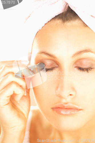 Image of Girl doing makeup