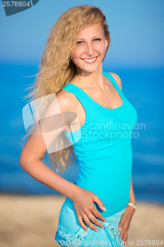 Image of Cheerful curly woman