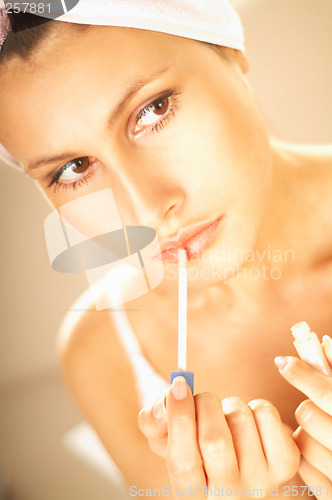 Image of Girl doing makeup