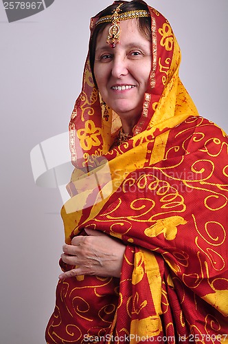 Image of senior woman in traditional Indian clothing and jeweleries