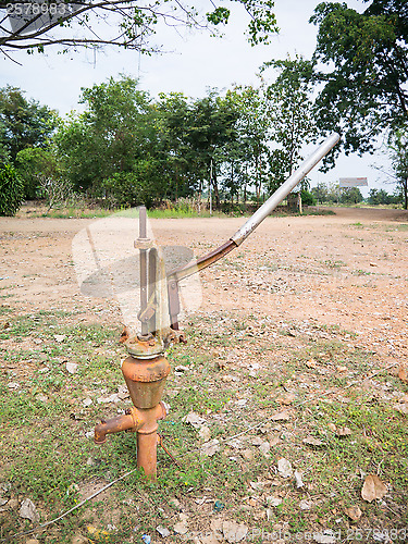 Image of iron hand pump