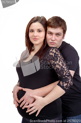 Image of loving happy couple, pregnant woman with her husband, isolated o