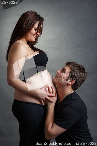 Image of Loving happy couple, pregnant woman with her husband