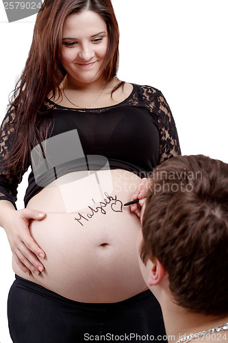 Image of loving happy couple pregnant woman with her husband