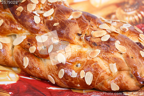 Image of detail of christmas cake with almonds