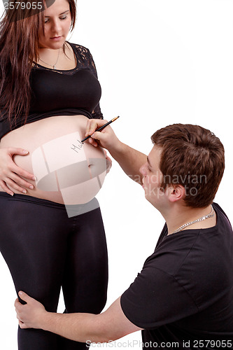 Image of loving happy couple pregnant woman with her husband