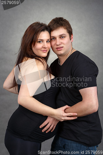 Image of Loving happy couple, pregnant woman with her husband