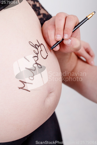 Image of loving happy couple pregnant woman with her husband