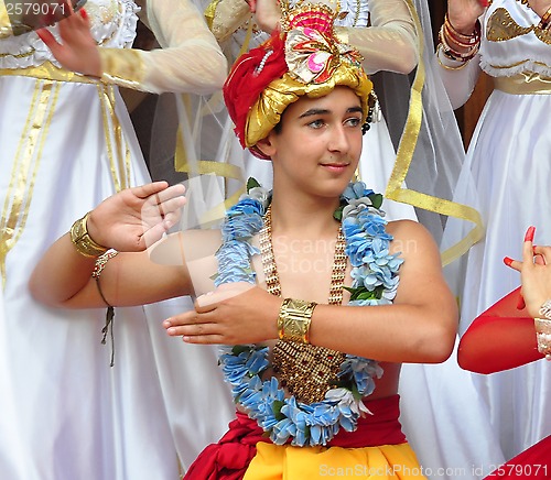 Image of teenage boy in traditional Indian clothing and jeweleries