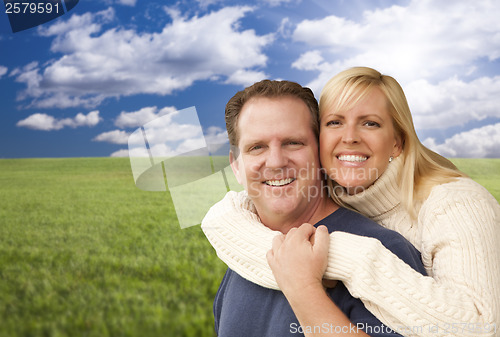 Image of Happy Attractive Couple Hugging at the Park