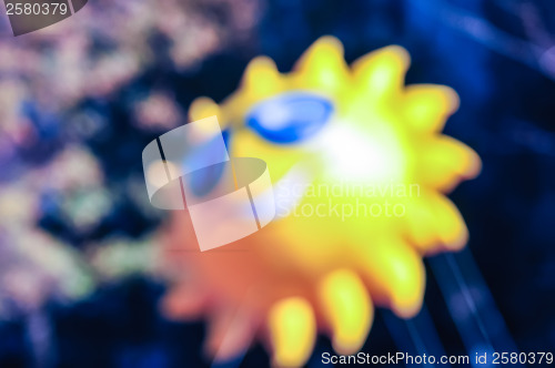 Image of abstract and defocused image of a thanksgiving parade in a big c