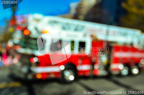 Image of abstract and defocused image of a thanksgiving parade in a big c