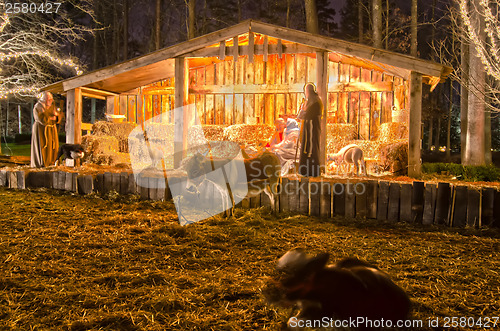 Image of visitors viewing live nativity play during christmas