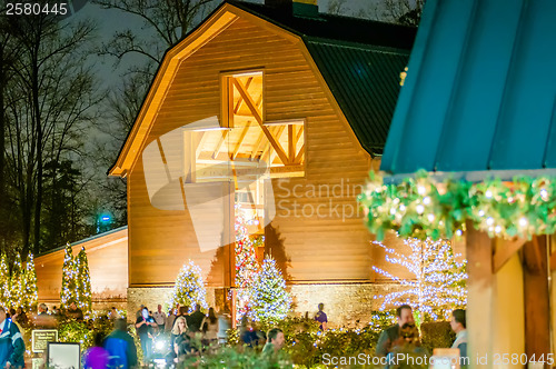 Image of visitors viewing live nativity play during christmas