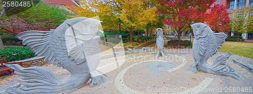 Image of giant fish structures in the green park in charlotte uptown