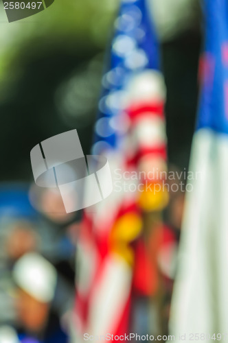 Image of abstract and defocused image of a thanksgiving parade in a big c