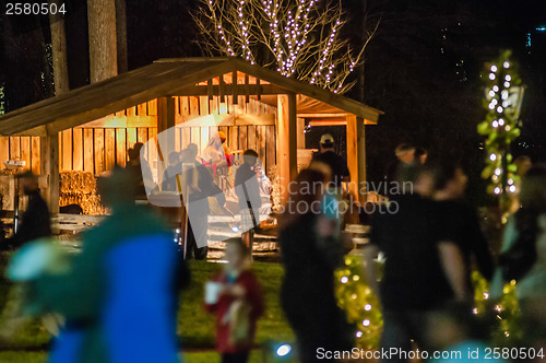 Image of visitors viewing live nativity play during christmas
