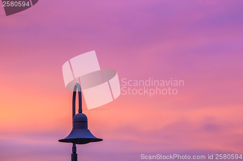 Image of lantern in red sky