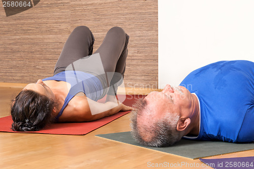 Image of Yoga Exercise - Setu Bandha Sarvangasana 