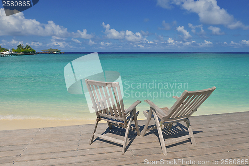 Image of tropical beach chairs