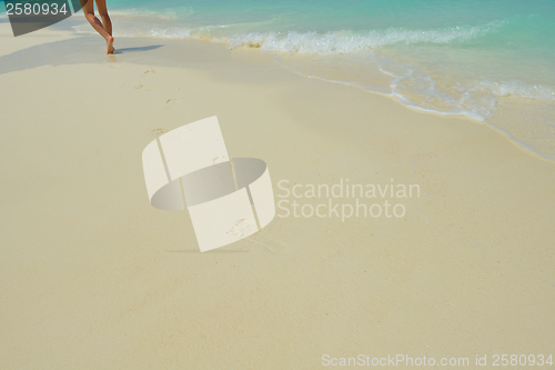 Image of footsteps on beach