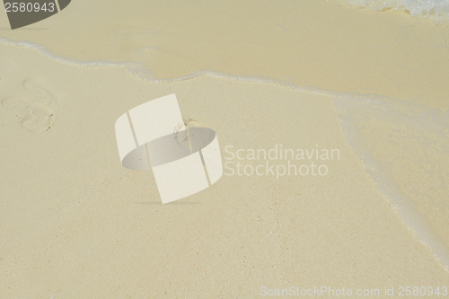 Image of footsteps on beach