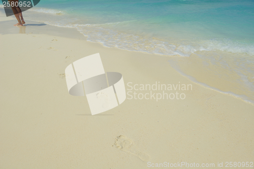 Image of footsteps on beach