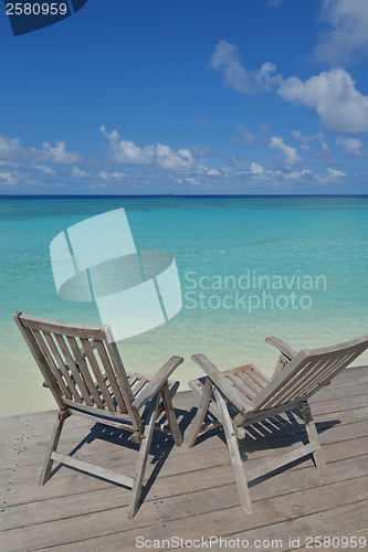 Image of tropical beach chairs