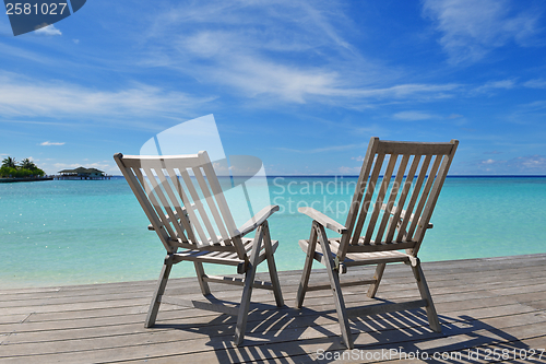 Image of tropical beach chairs