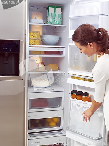 Image of woman looking for something to eat