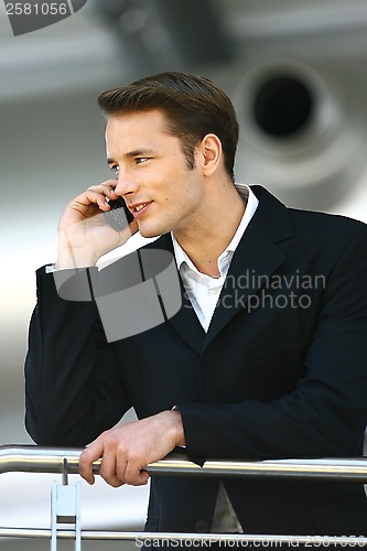 Image of man enjoying with cellphone l