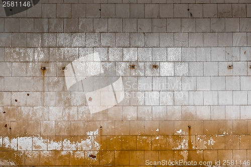 Image of Old tiled wall of an industrial building