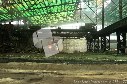 Image of Industrial interior with bulldozer inside