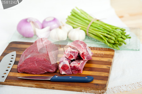 Image of raw beef and pork ribs