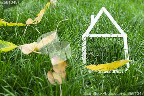 Image of Model house made on green grass