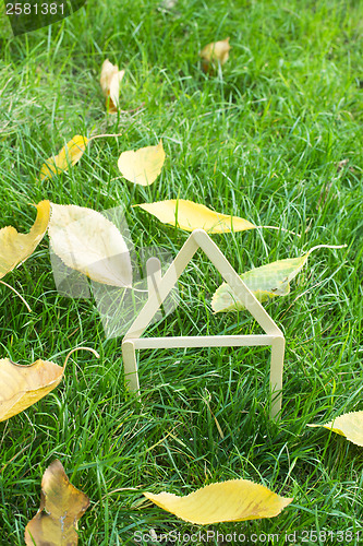 Image of Model house made on green grass