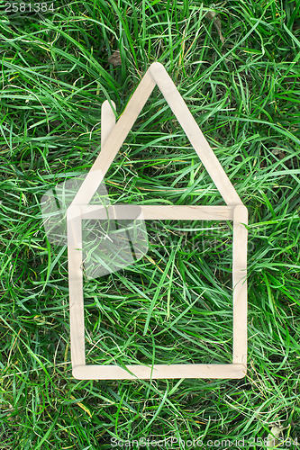 Image of Model house made on green grass