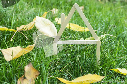 Image of Model house made on green grass