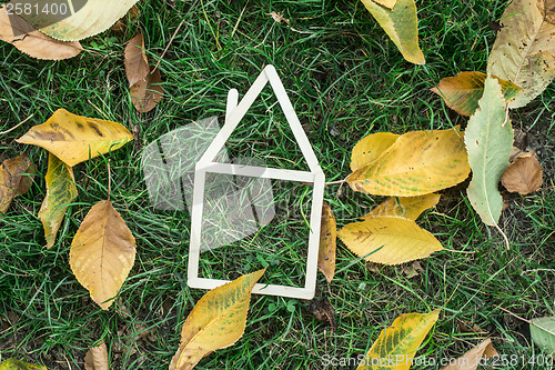 Image of Model house made on green grass