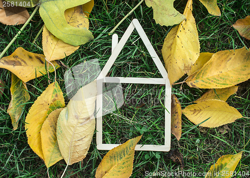 Image of Model house made on green grass