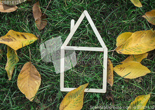 Image of Model house made on green grass