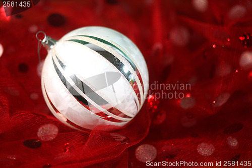 Image of Holiday Ornament on Festive Fabric